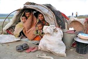 people protecting themselves from cold in a hut.